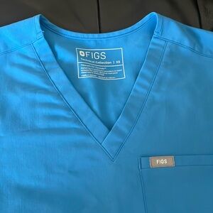 Women’s figs xs 1 pocket top . Like new . No wear. Perfect condition